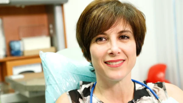 Patient is Smiling in dentist chair