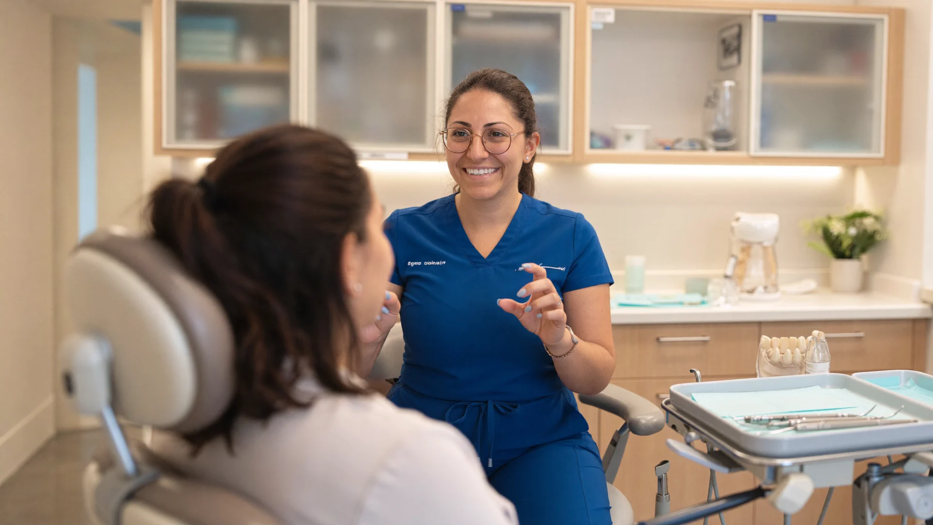 Dr Caroline Samaan consulting with patient in office