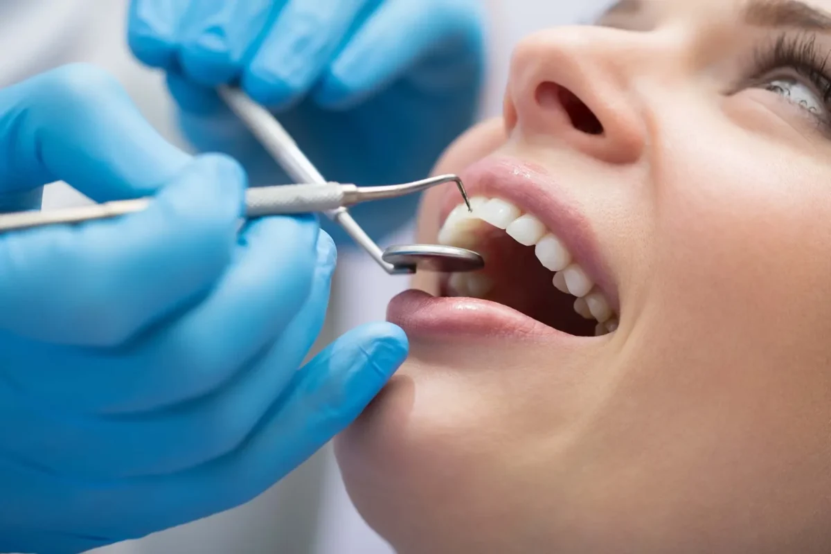 SEDA DENTAL DENTIST EXAMINING THE PATIENT