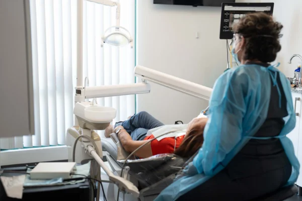 Patient receiving dental treatment