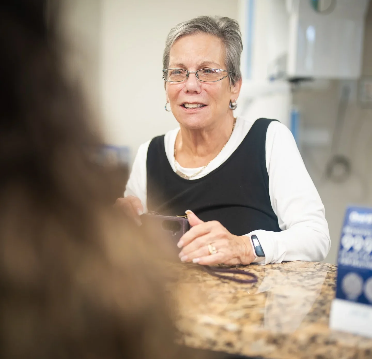Patient at SEDA Dental Pompano Beach discussing affordable payment option