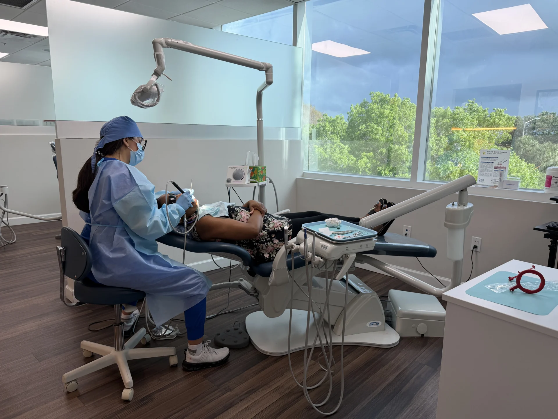 Dental patient receiving treatment in office