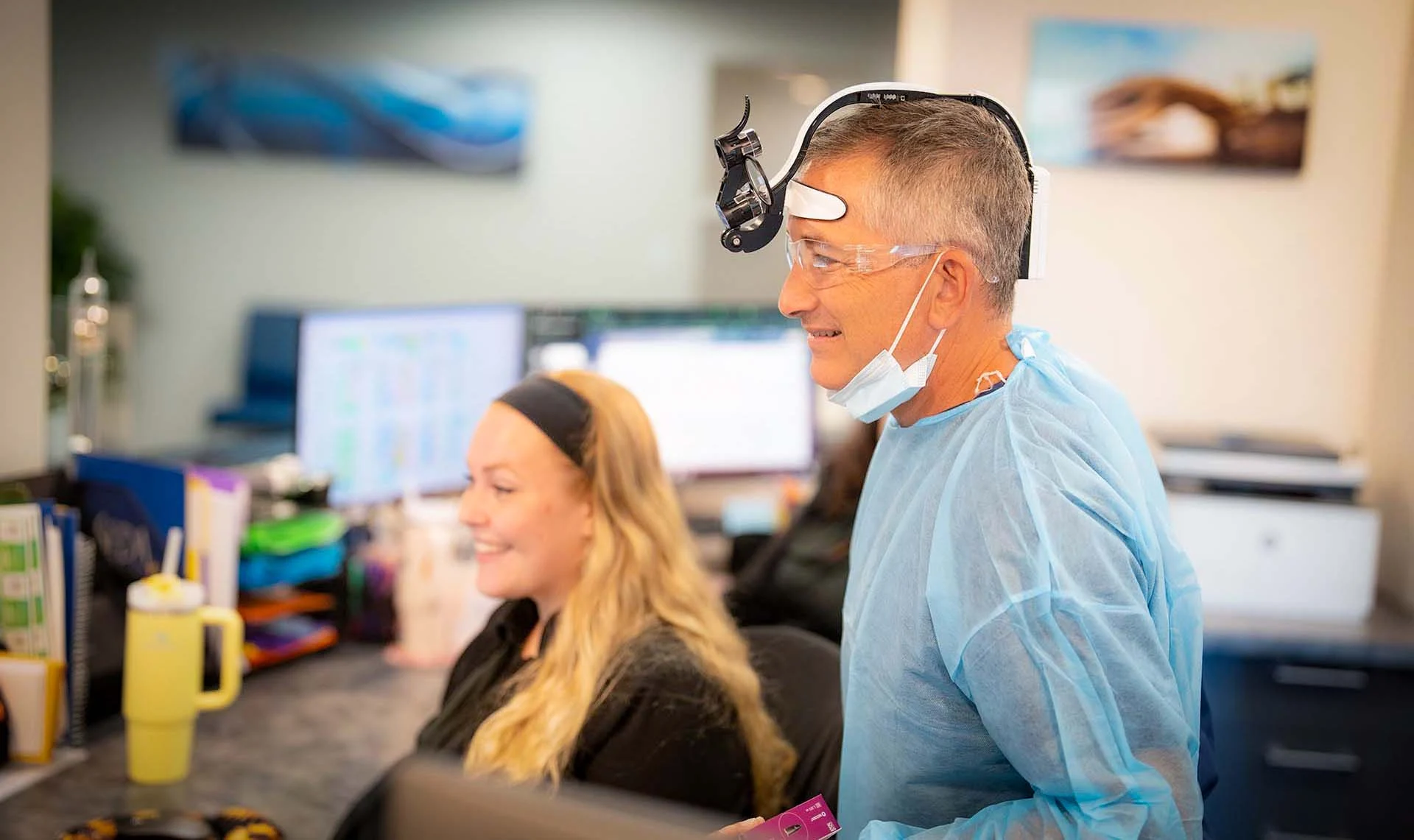 Dr Rubinstein at the front Desk in Seda Dental Boynton Beach